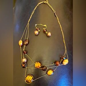 Three strand beaded necklace and matching earrings